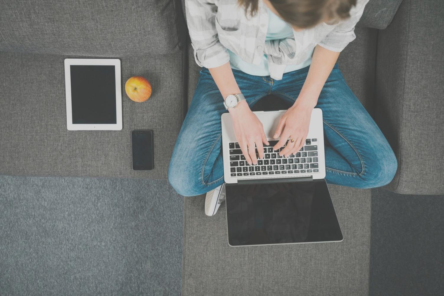 Professional budget analysis meeting with financial documents and laptop